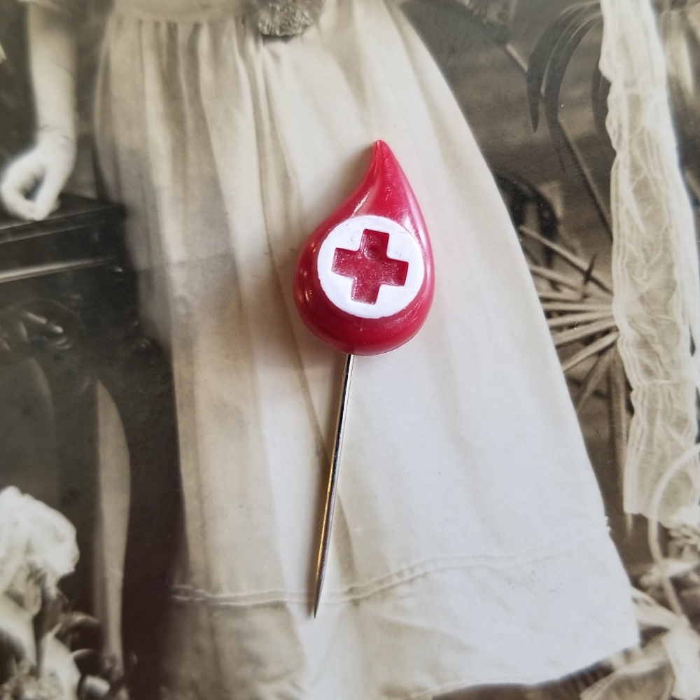 Vintage Red Cross drop of blood lapel pin red plastic donation